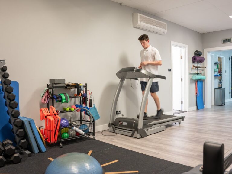 guy walking on a treadmill